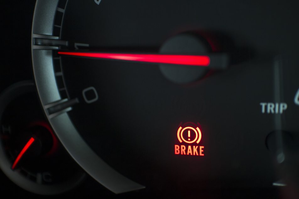 brake warning light on dashboard of vehicle