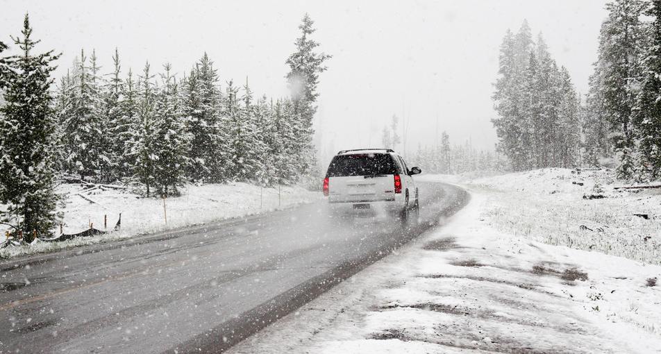 vehicle driving on salt covered roads in winter