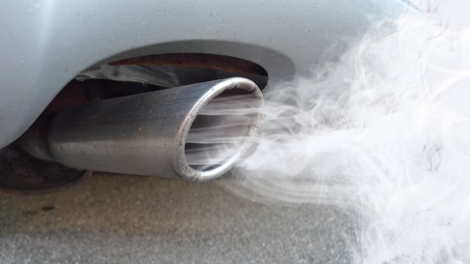 car emissions coming from exhaust pipe