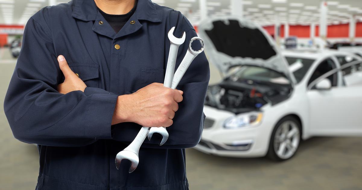 certified mechanic repairing car issues