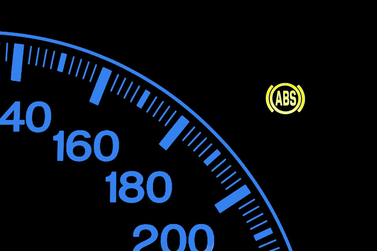 anti-lock braking system light on car dashboard