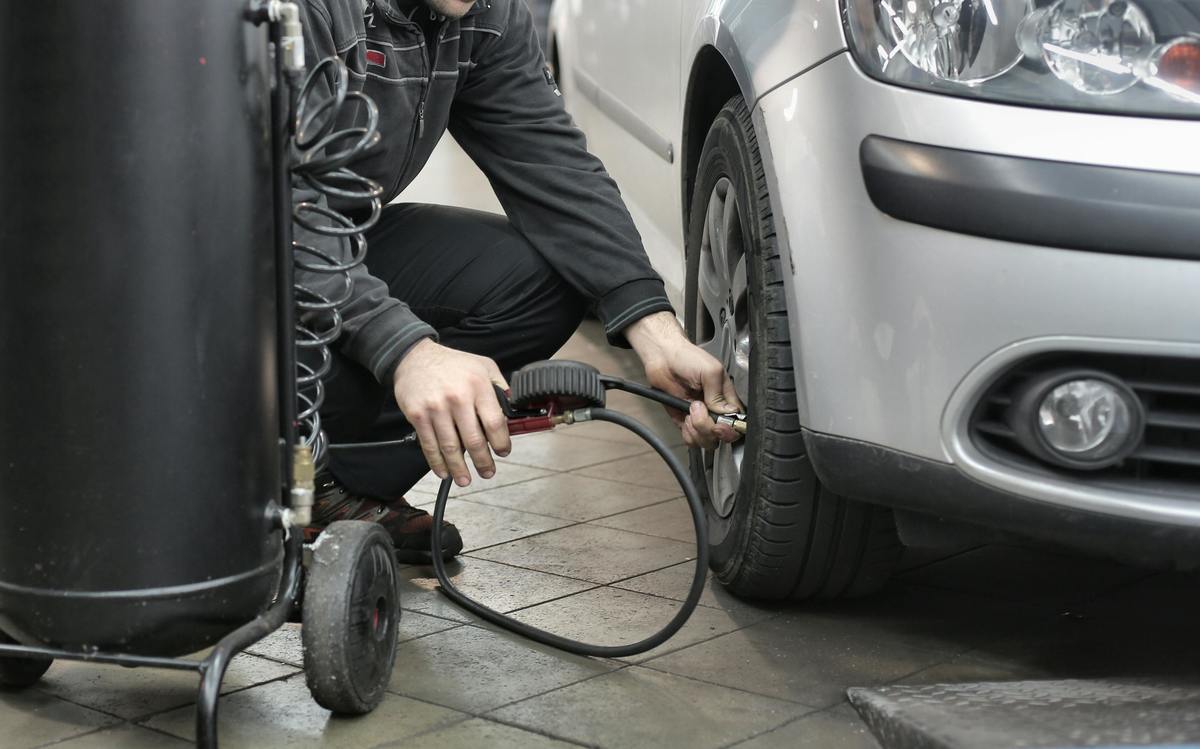 mechanic performing tire maintenance