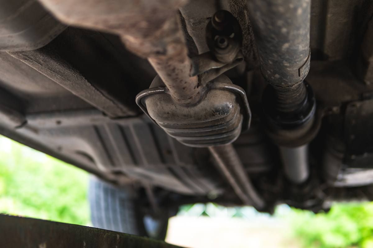 catalytic converter shown on the undercarriage of a vehicle