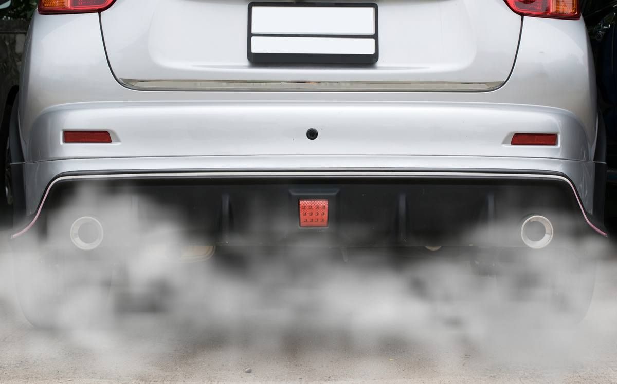 car emitting toxic fumes from exhaust